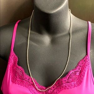 Necklace long chain of sphere link patterns